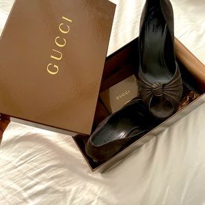 Gucci peep toe pumps, excellent condition. Worn once for a wedding.